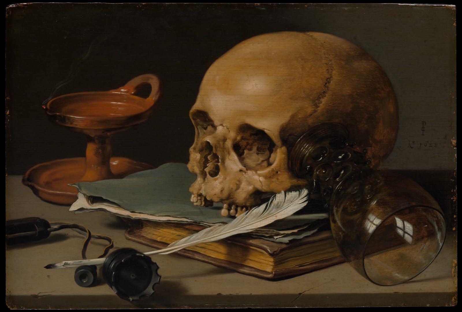 A skull, a writing quill, an overturned glass and a book on a table, painted in muted browns.